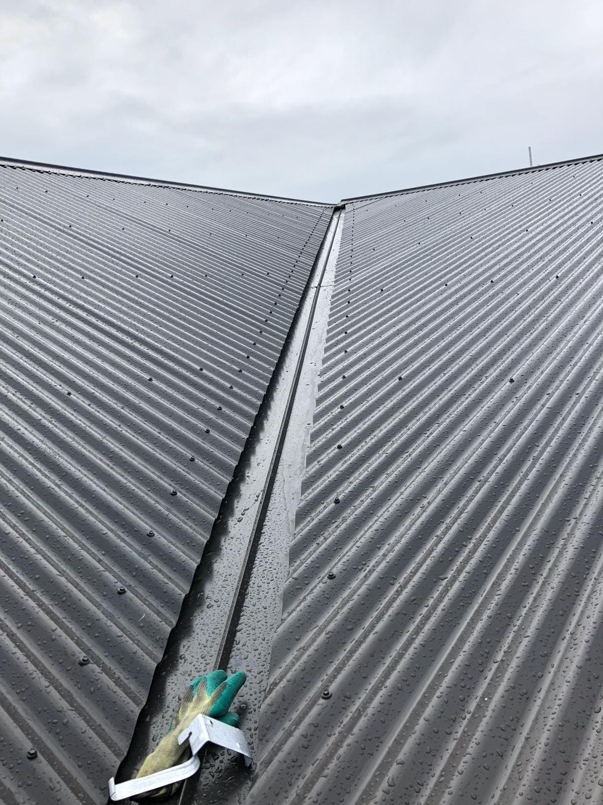 New long-run roof valley and flashings