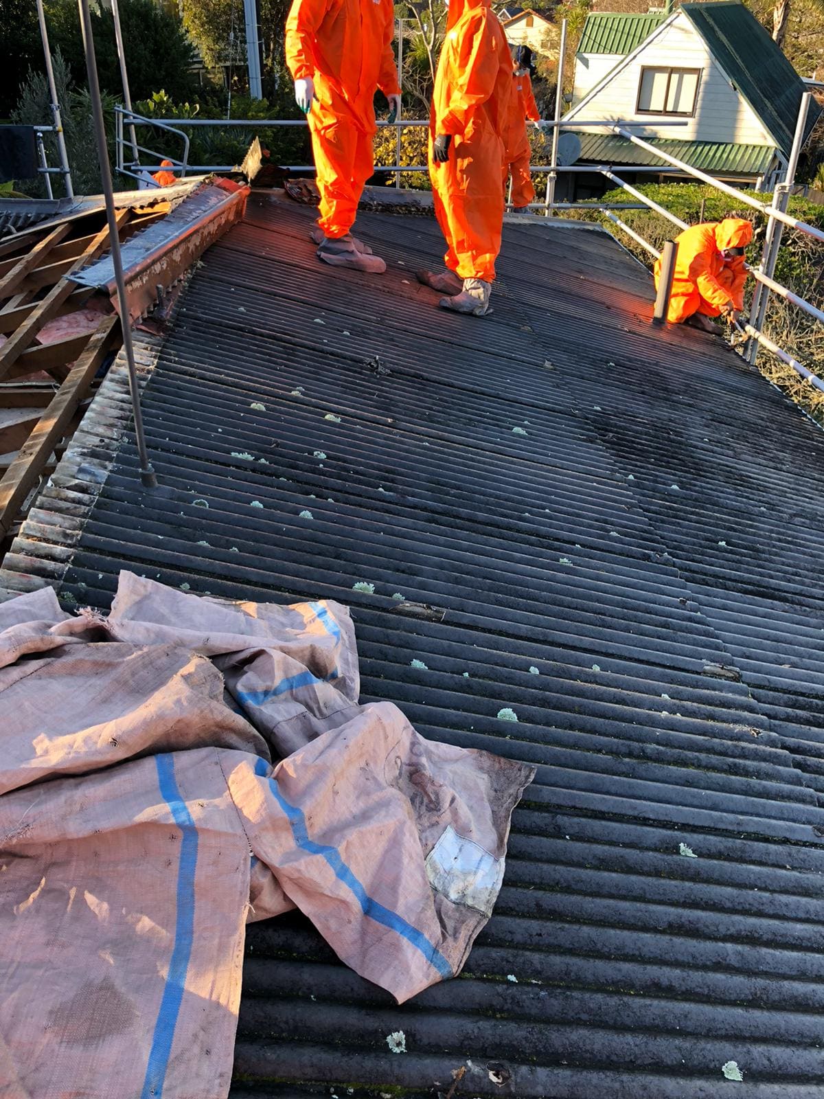 Asbestos roof removal in progress on an Auckland home