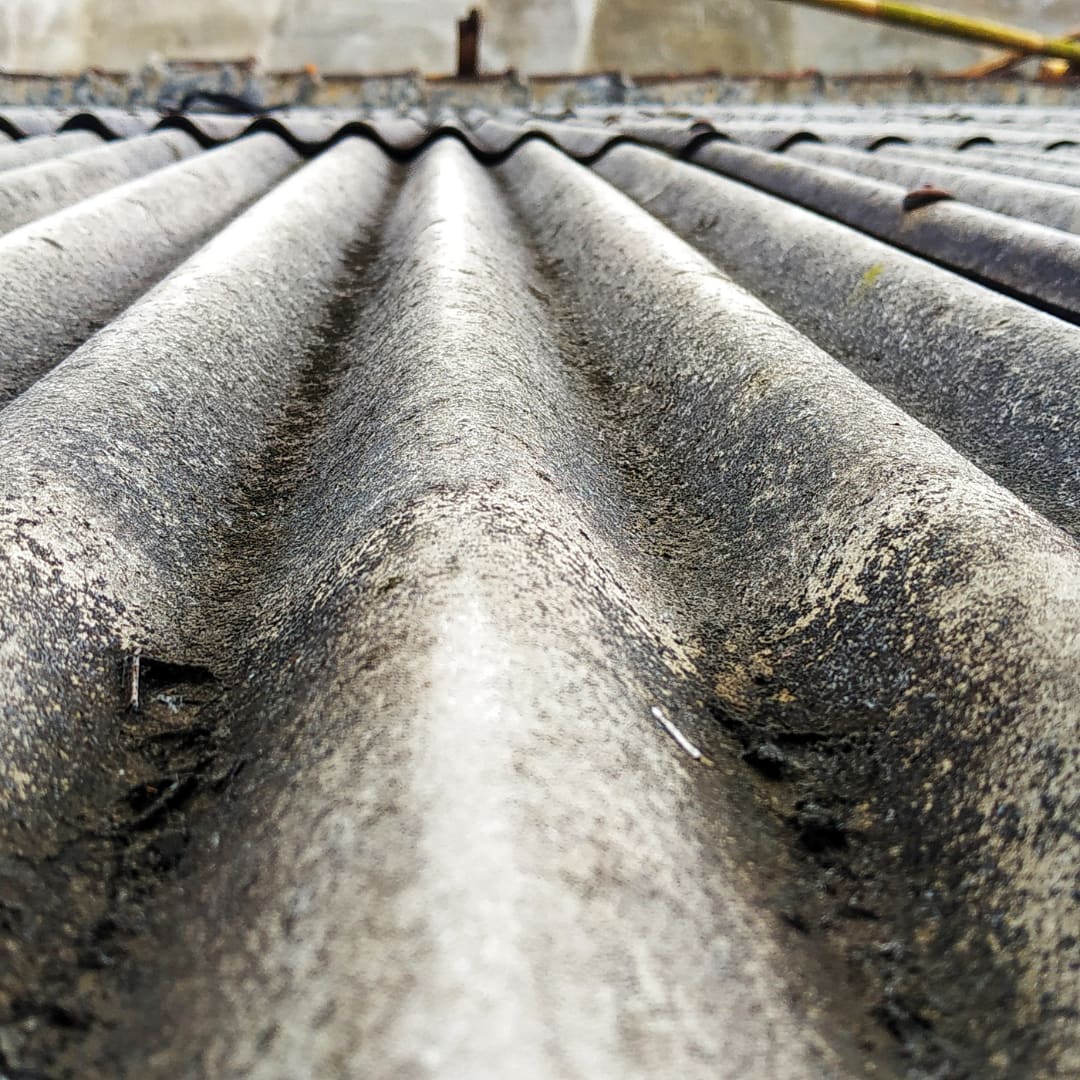 Close-up of an encapsulated corrugated asbestos roof