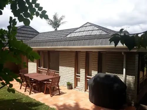 Single-storey house with an asbestos shingle roof