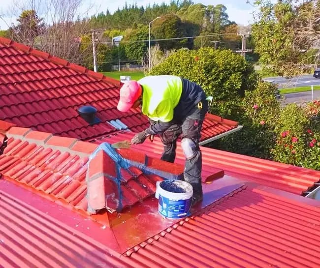 JP Franklin roofer at work on a tiled roof